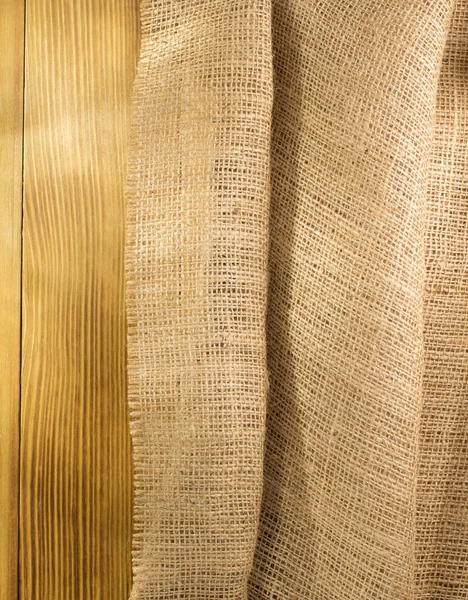 Kleckse hessischer Säcke auf Holz — Stockfoto