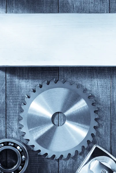 Circular saw blade on wood — Stock Photo, Image