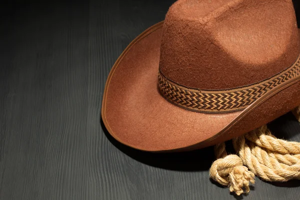 Cowboy hat on wood — Stock Photo, Image