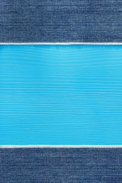 Blue jeans textuur op hout — Stockfoto
