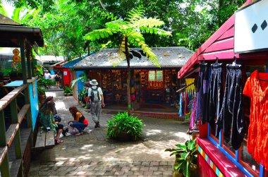 Shoppers at the Original Rainforest  Markets in Kuranda Queensla clipart