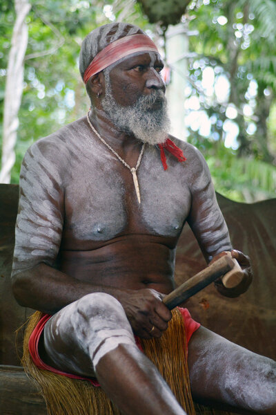 Yirrganydji Aboriginal man play Aboriginal music with Clapstick