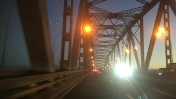Traffic over Auckland Harbour Bridge New Zealand at dusk — Stock Video