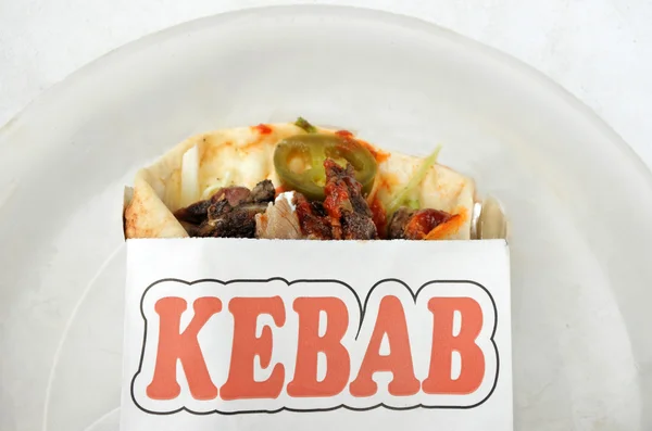 Flat lay view of Kebab wrap with grilled lamb — Stock Photo, Image