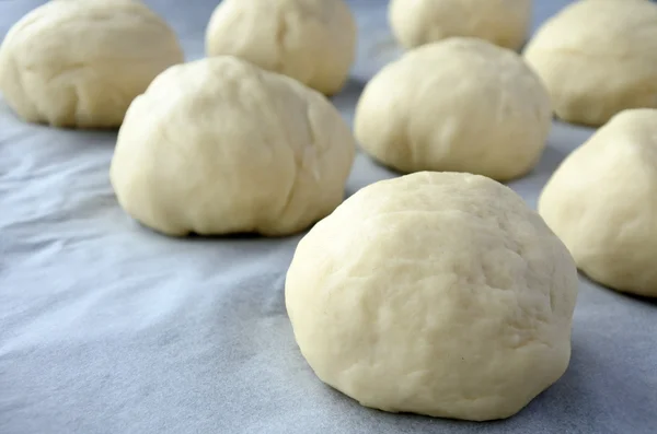 Close up view of round pieces of dough Bread Rolls — Stock Photo, Image