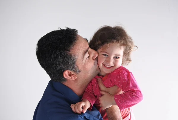 Father kisses his daughter — Stock Photo, Image