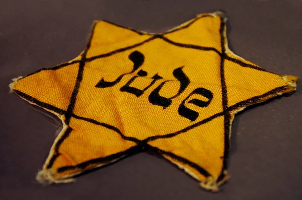 Yellow Jewish badge — Stock Photo, Image