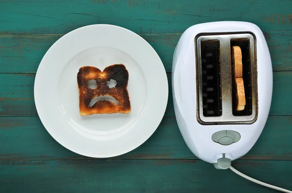 Flat lay view of one slices of burnt toast — Stock Photo, Image