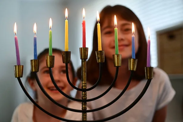 Two Happy Jewish Sisters Looking Singing Beautiful Menorah Candelabra Glowing — Stock Photo, Image