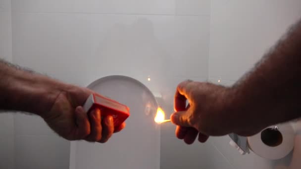 Person Lighting Match Restroom Get Rid Bed Odors — Stock Video