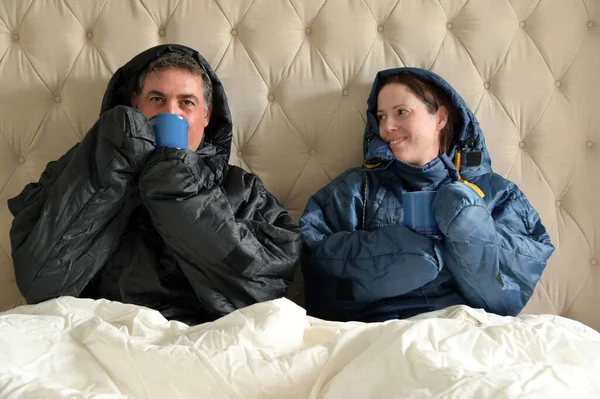 Happy Couple Sitting Side Side Wearing Very Warm Clothing Covered — Stock Photo, Image