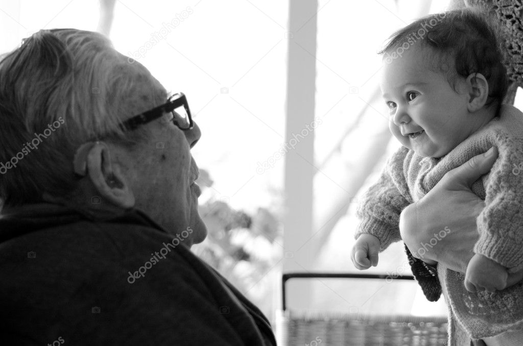 Granddad plays with grandchild
