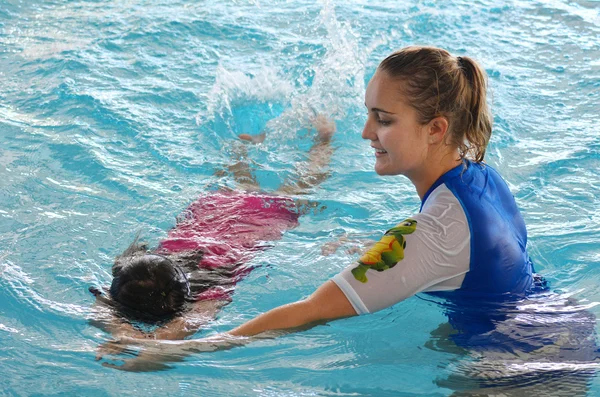 Child swimming pool lesson — Stock Photo, Image