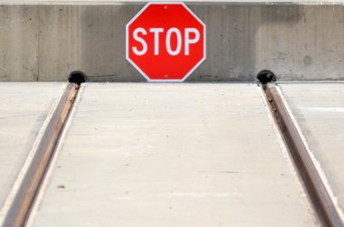 Buffer stop with a stop sign clipart