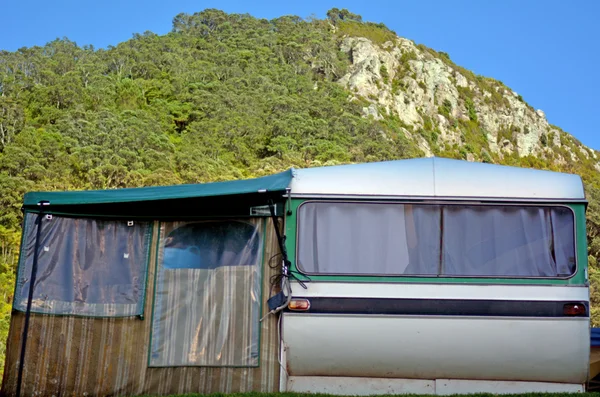 Camping caravan under Mount — Stock Photo, Image