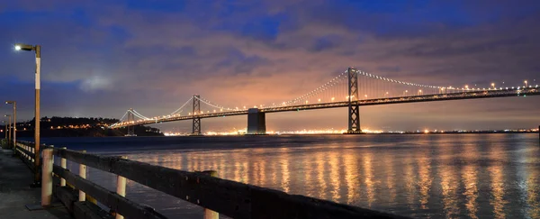 Oakland Bay Bridge lights in dusk in San Francisco, California — 图库照片