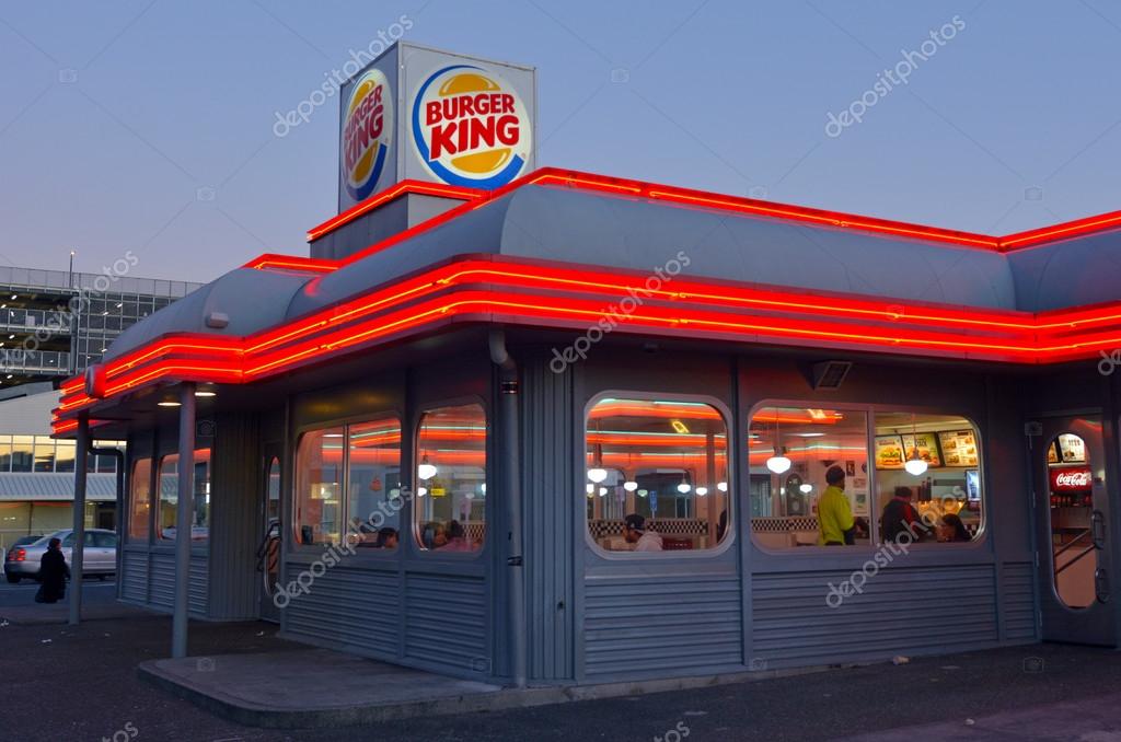 HAMILTON, NZL - JUNE 16 2015:Burger King restaurant at dusk. At the end of its 2013 fiscal year, Burger King is the second largest chain of hamburger fast food restaurants in terms of global locations