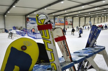 Snowboards rack in Snowplanet in Auckland - New Zealand clipart