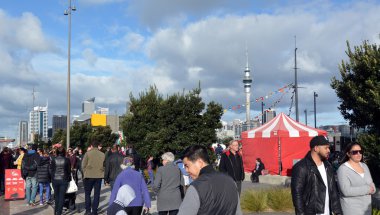Mixed race people visit at Wynyard Quarter in Auckland, New Zealand