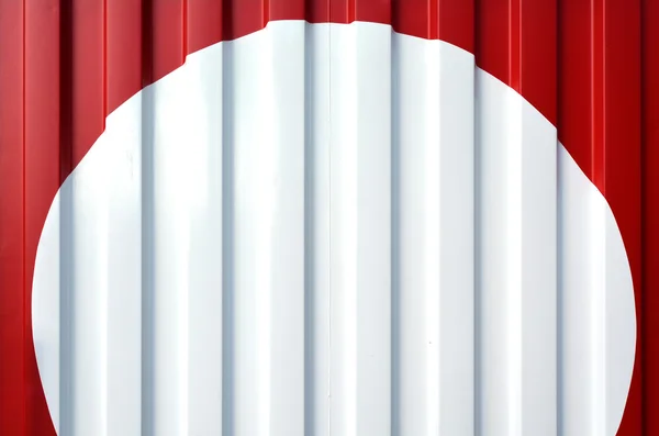 A white circle inside a red background — Stock Fotó