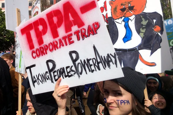 Thousands march against TPP trade agreement in Auckland - New Ze — Stok fotoğraf