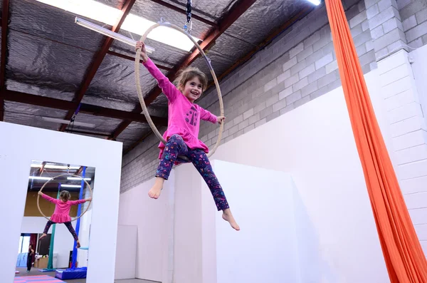 Little child learn circus skills on Aerial Lyra — Stock Photo, Image