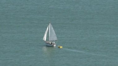 Yacht setting a sail