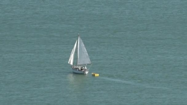 Yacht setting a sail — стокове відео