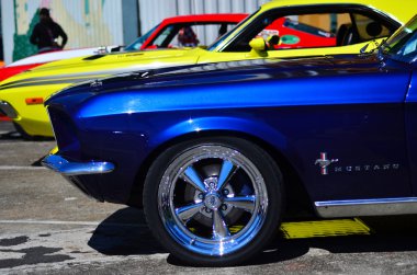 Ford Mustangs in a public US muscle cars V8 car show