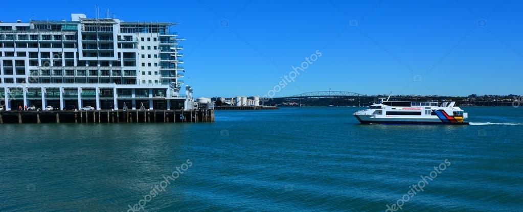 AUCKLAND,  NZL - NOV 05 2015:Fullers MV Quick Cat ferry sail near Princes Wharf. On December 12, 2013, Hilton again became a public company in its second IPO to raise an estimated $2.35 billion.