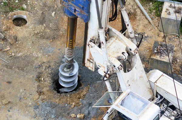 Hydraulic hammer drilling machine at construction site — Stock Photo, Image