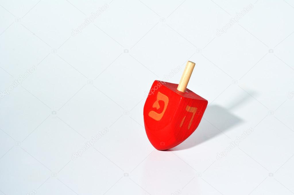 One Red Dreidel (sevivon) spin during the Jewish holiday of Hanu