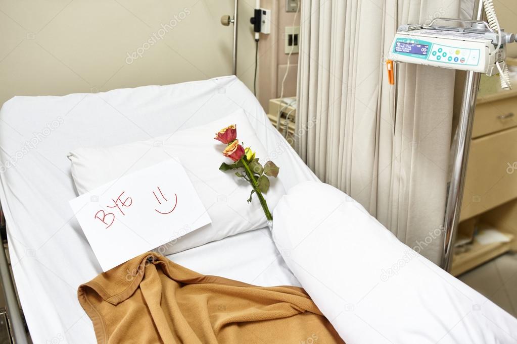 Empty hospital bed after recovery