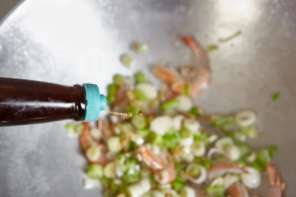Adding sauce — Stock Photo, Image