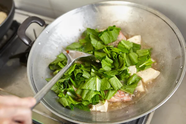 Adding vegetable — Stock Photo, Image