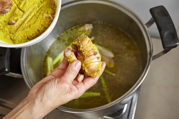 Adding spices and herbs — Stock Photo, Image
