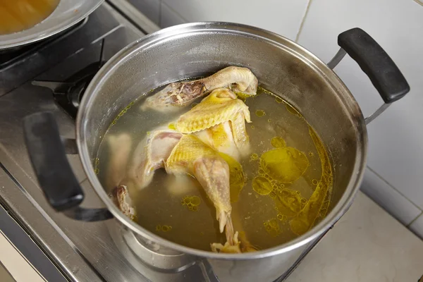 Chicken and the stock soup — Stock Image Chicken and the stock soup Royalty Free Stock Photos