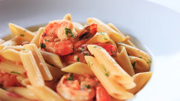 Penne com camarões e alho Fotografia De Stock