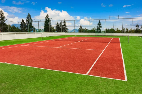 Synthetic outdoor tennis court Stock Photo