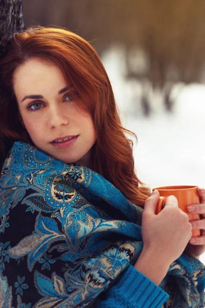 Beautiful woman holding tea cup — Stock Photo, Image
