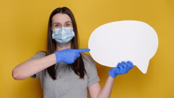 Young Woman Medical Mask Protective Gloves Holding Blank Speech Bubble — Stock Video