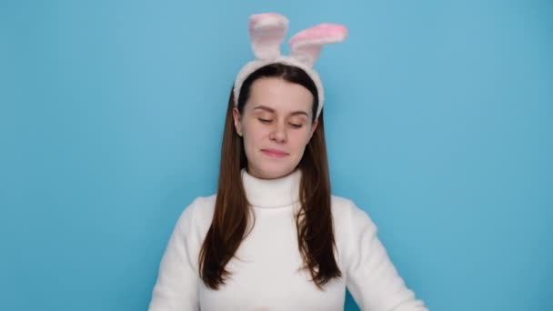 Portrait Beautiful Smiling Young Female Bunny Fluffy Ears Showing Hands — Stock Video