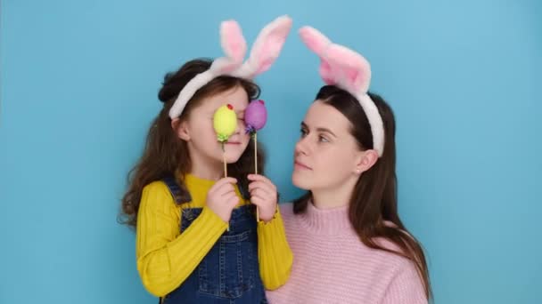 Emotional Young Mother Pink Bunny Ears Carries Little Cheerful Girl — Stock Video