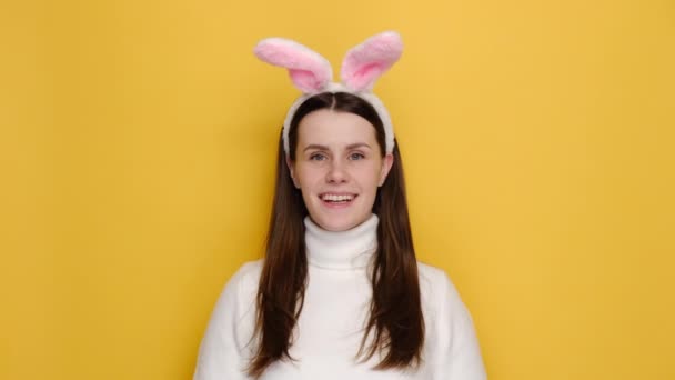 Smiling Beautiful Caucasian Female 20S Pink Bunny Fluffy Ears Looking — Stock Video