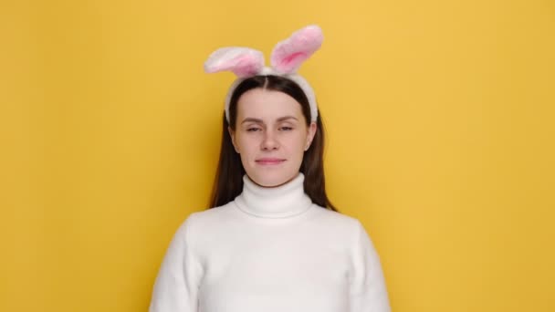 Positive Smiling Young Woman Pink Bunny Fluffy Ears Showing Hands — Stock Video