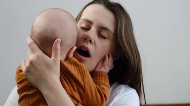 Head Shot Side View Tired Caring Young Mother Yawning While — Stock Video