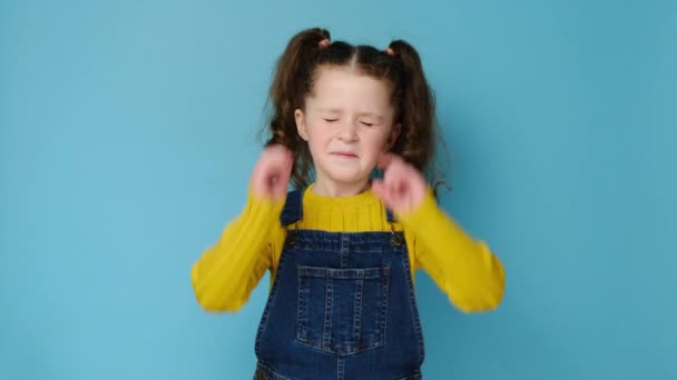Unhappy Little Preschool Girl Kid Having Discontent Look Plugging Her — Stock Video