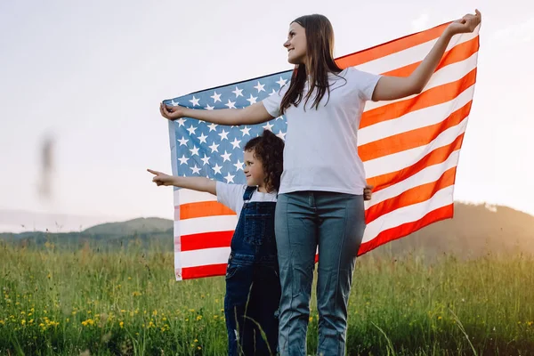 Close Happy Young Mother Cute Small Daughter Kid National Flag —  Fotos de Stock