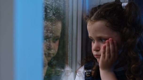 Close Sad Upset Little Kid Sitting Windowsill Sad Look Away — Stock Video