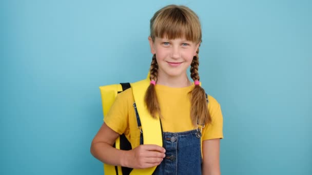 Portrait Happy Smiling Caucasian Blonde Little Girl Kid Schoolgirl Holding — Stock Video